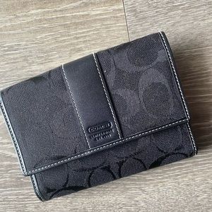 Black Coach wallet w/ white stitching